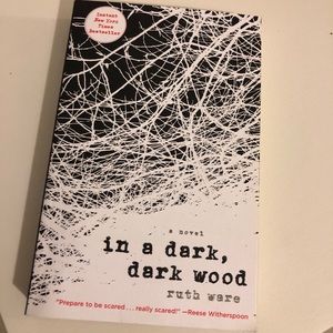 Paperback book In A Dark, Dark Wood